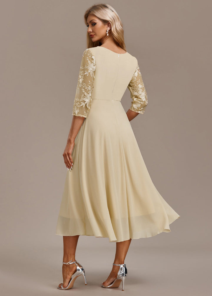 Elin™ | Champagne jurk met delicate borduursels