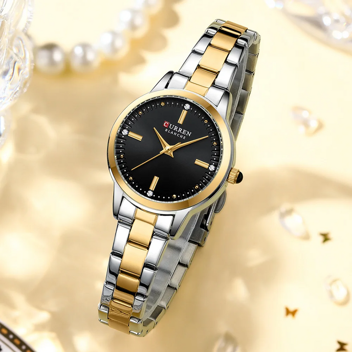 Luxe dameshorloge met mesh band en minimalistische wijzerplaat