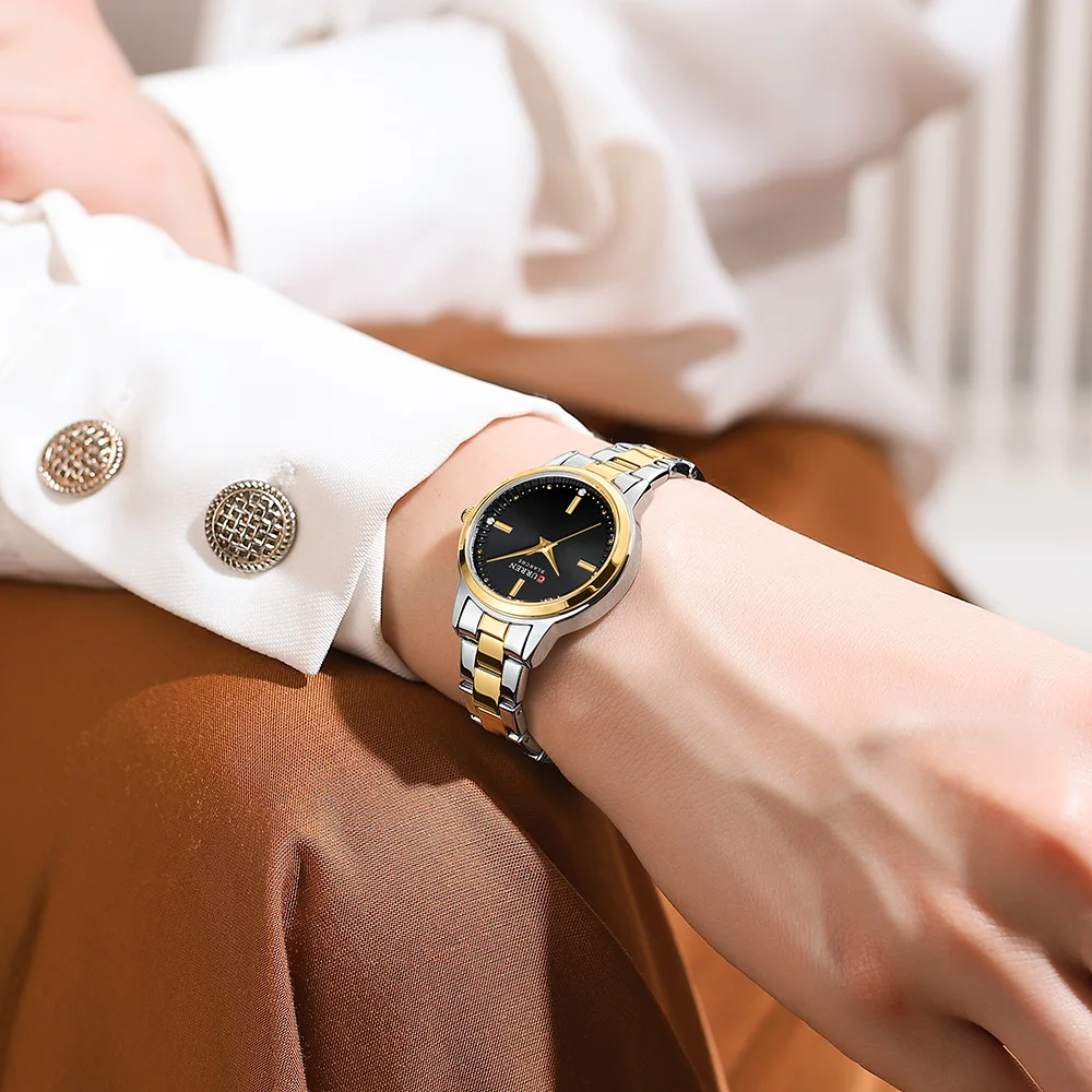 Luxe dameshorloge met mesh band en minimalistische wijzerplaat